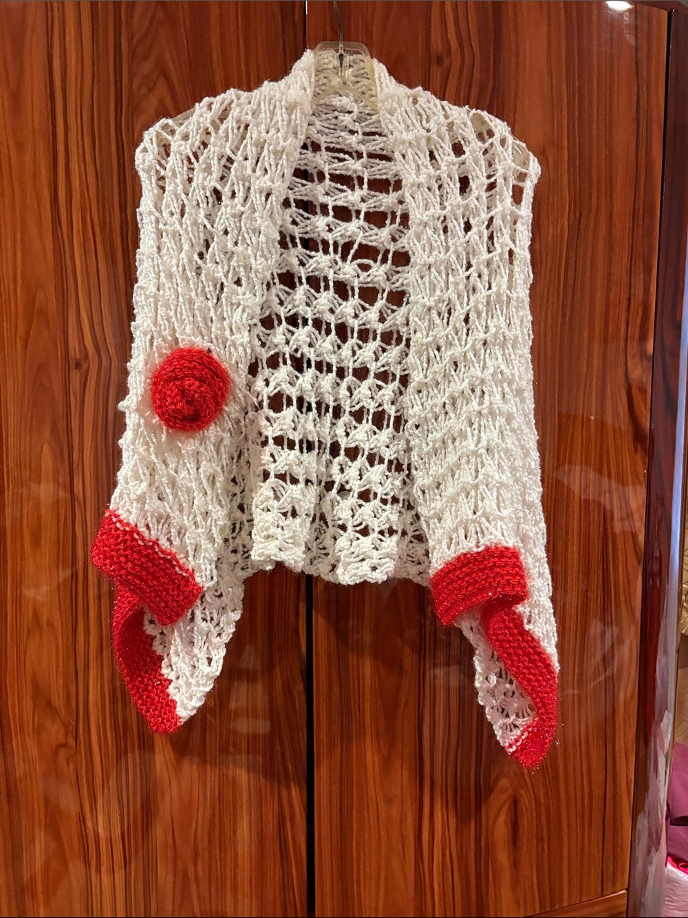 Open-Knit Cream Poncho with Red Trim and Rosette handsome new